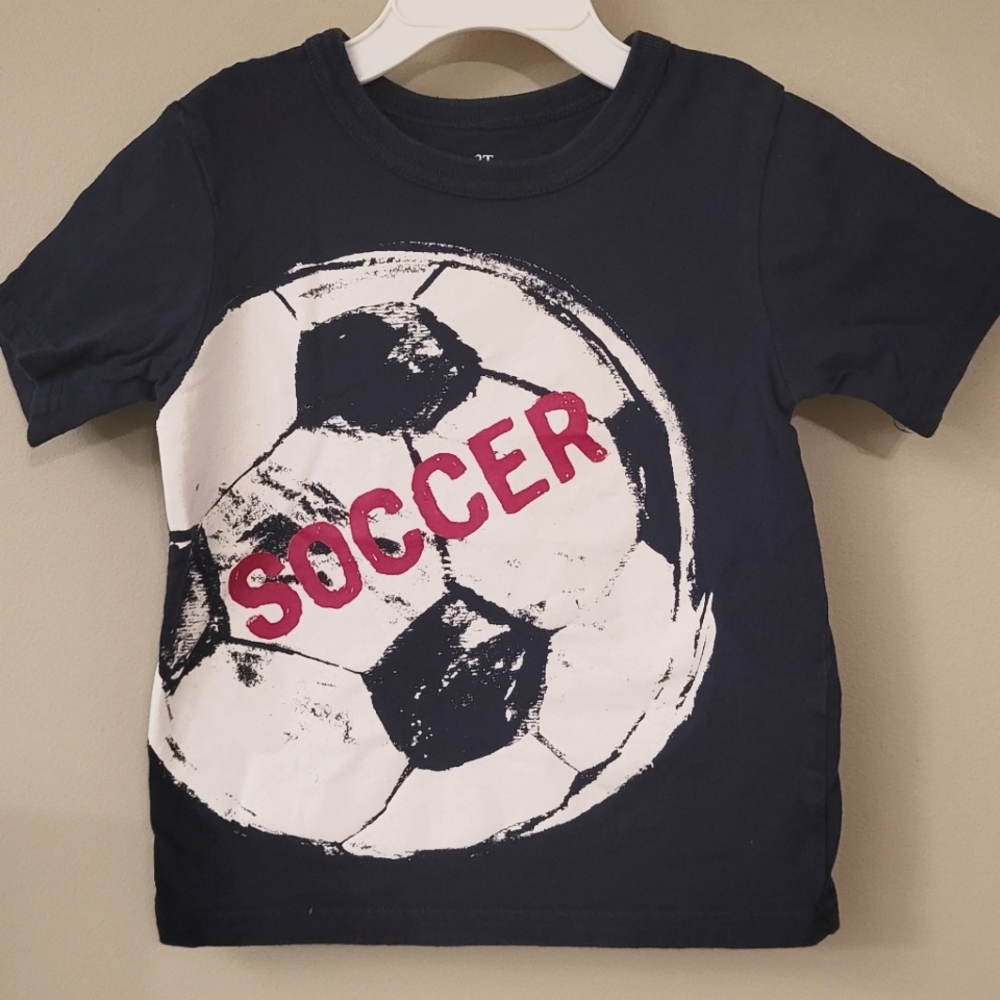 Navy soccer short sleeved tee shirt